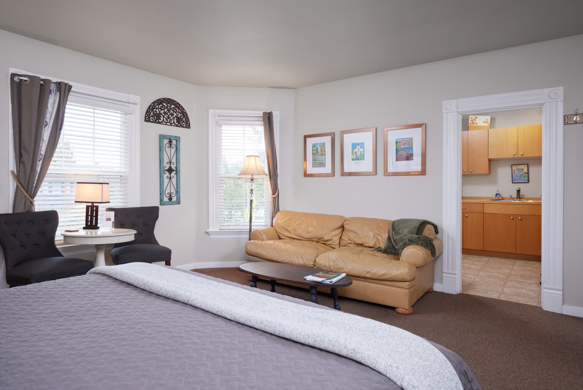The Vineyard living room with framed valley artwork