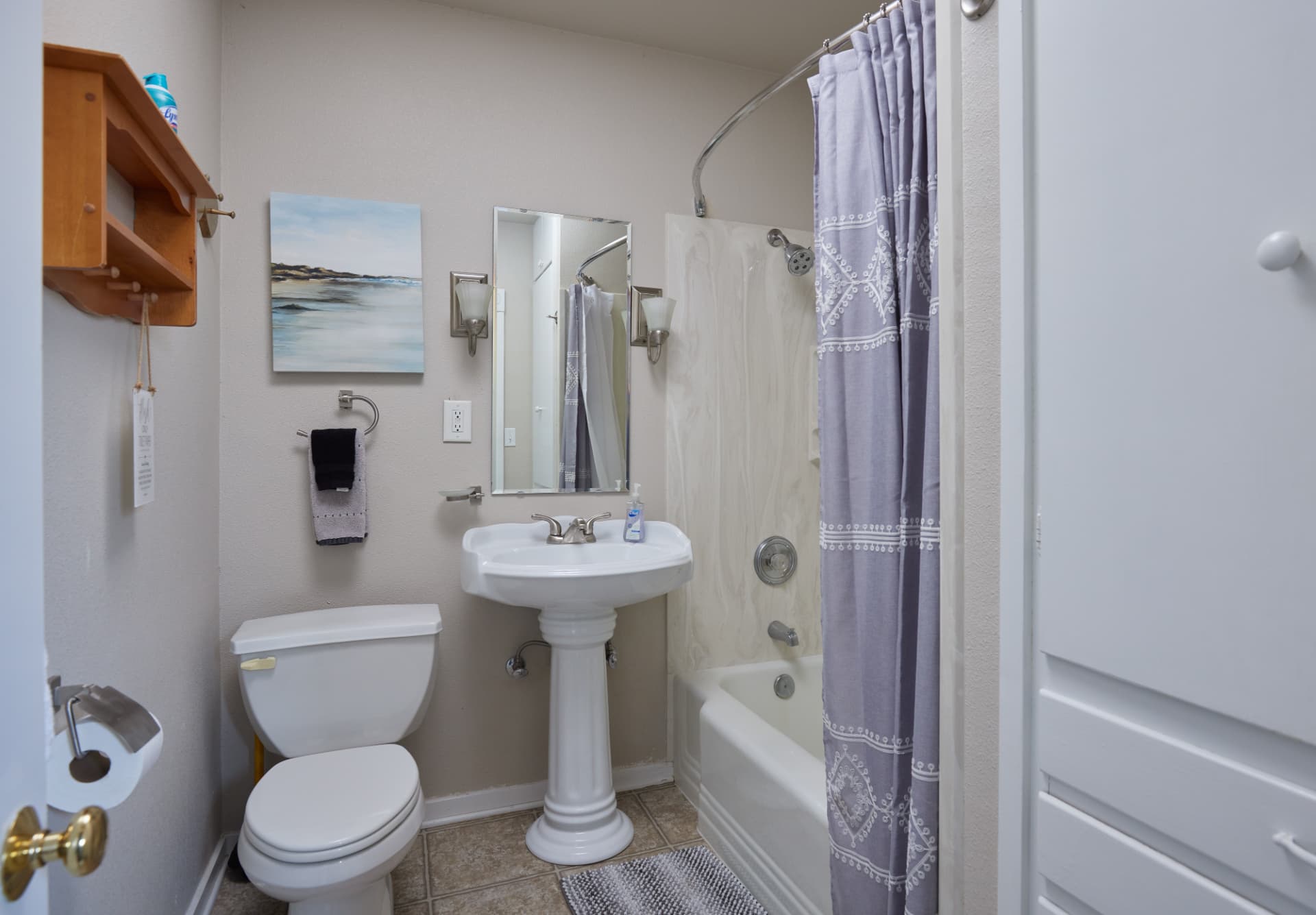 The Harbor bathroom with pedestal sink and shower